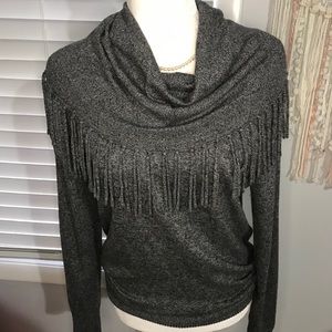 Chelsea and Theodore grey knit sweater.